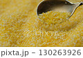 Macro Texture Of Raw Corn Grits Pour Out Of Spoon Slow Motion 130263926