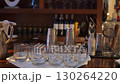 An Elegant Bar Setup featuring Glasses, Various Mixology Tools, and a Chic Atmosphere 130264220
