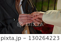 The romantic ring exchange at the engagement ceremony celebrates the couples love and commitment 130264223