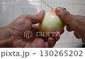 Fresh Onion Being Chopped, Slicing Onion Rings, Cooking Preparation with Onion 130265202
