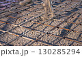 Concrete being poured onto rebar foundation at construction site 130285294