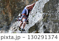 Close up of a man rock climbing 130291374
