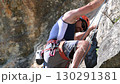 Close up of a man rock climbing 130291381