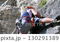 Close up of a man rock climbing 130291389
