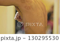 Boxer practicing punches in gym 130295530