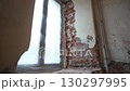 Cracked plaster reveals hidden ancient fragile bricks 130297995