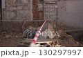 Stripped warning tape surrounds construction area 130297997