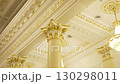 Opulent hall gleams with gold-inlaid stucco on columns 130298011