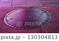 Neon-lit manhole 130304813