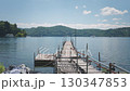 Pier stretching out over the lake 130347853