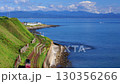 内浦湾（噴火湾）沿いを走る函館線の貨物列車 130356266