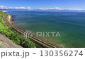 内浦湾（噴火湾）沿いを走る函館本線の特急列車 130356274