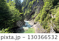 Serene Natural Canyon with Flowing River 130366532