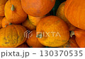 Pumpkins in a pile, perfect for autumn or Halloween theme, ideal for seasonal background video 130370535