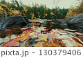 Leave in creek with beautiful Autumn foliage and stunning nature colors 130379406