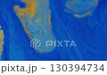 Blend shimmer. Pigment fluid. Defocused blue yellow color marble enamel water chemical flow moving on abstract acrylic background. 130394734