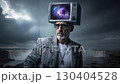 A man with a television on his head standing in front of a waterfall 130404528