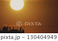 Big sun and a view of the rooftops of the city. Timelapse 130404949
