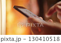 Person hand swiping smartphone manga comic with cute anime maid girls 4K 130410518