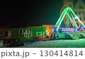 A popular attraction known as a pirate ship and a fairground merry go round. A pirate ship as a carnival attraction. A traditional pirate ship as a swing ride. The concept of fairground festivals and 130414814