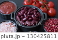 Red beans canned as an ingredient for cooking healthy or vegetarian food. Canned beans as a background for your design 130425811
