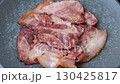Cooked fried crispy bacon as an ingredient of a delicious English breakfast. Pieces of fried bacon as a background for your design 130425817