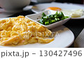scrambled egg Close-Up of Creamy Scrambled Eggs in a Ceramic Serving Bowl 130427496