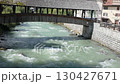 Dimaro, Trentino, Italy. Tradinional wood bridge on a stream Dimaro, Trentino, Italy. Tradinional wood bridge on a stream 130427671