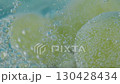 Fresh green grapes submerged in clear water create an appealing view as bubbles 130428434