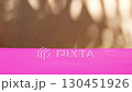 Background video with empty space of pink plane in foreground with background of orange blurred wall with round light spots of falling sunlight from tree canopy. Blank template footage for artworks 130451926