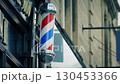 Barber Hairdressers Sign On Building In The Daytime 130453366