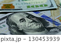 Background of US dollar bills. Pile of american cash. One hundred usd dollars banknotes	 130453939