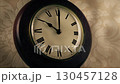 Shadows Move Over Wall Clock In The Evening 130457128
