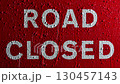 Rain On Road Closed Sign Close-Up 130457143