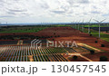 Solar panels and wind turbines in renewable energy 130457545
