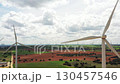 Wind turbines rotating over colorful farmland 130457546