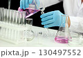 A researcher was conducting research in the laboratory.  130497552