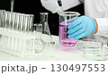 A researcher was conducting research in the laboratory.  130497553