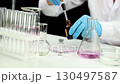 A researcher was conducting research in the laboratory.  130497587