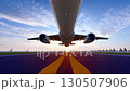 airplane taxiing for takeoff on the airport runway 130507906