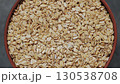 Dry Oatmeal in Clay Bowl Rotation Top View 130538708