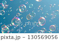 Soap bubbles flying in the sky 130569056