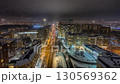 Night view of a snowy big city in time lapse style 130569362