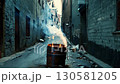 Burning barrel in deserted alley, growing flames and smoke 130581205