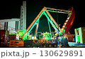 A popular attraction known as a pirate ship and a fairground carousel. A pirate ship as a fairground attraction. A traditional pirate ship as a swing ride. The concept of fairground festivals and 130629891