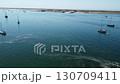 Approach from Ria Formosa towards the Culatra Island in Algarve, Portugal Approach from Ria Formosa towards the Culatra Island in Algarve, Portugal 130709411