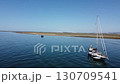 Ria Formosa riverbed with Fundo do Albufeira with yachts anchored in the river Ria Formosa riverbed with Fundo do Albufeira with yachts anchored in the river 130709541