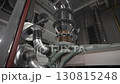 Smooth surface of steel tube gleams under cold light 130815248