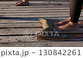 Woman Standing on a Sadhu Board 130842261