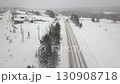 Snowy Road in the Russian Countryside An Extensive Winter Landscape Aerial View 130908718